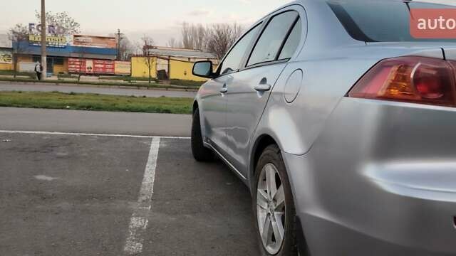 Серый Мицубиси Лансер, объемом двигателя 1.5 л и пробегом 201 тыс. км за 5600 $, фото 3 на Automoto.ua