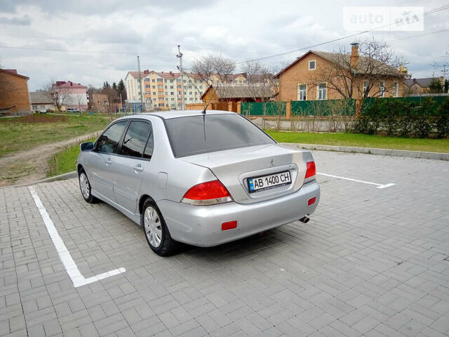 Сірий Міцубісі Lancer, об'ємом двигуна 1.6 л та пробігом 270 тис. км за 3750 $, фото 5 на Automoto.ua