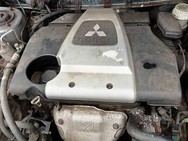 Серый Мицубиси Лансер, объемом двигателя 1.6 л и пробегом 180 тыс. км за 1300 $, фото 5 на Automoto.ua