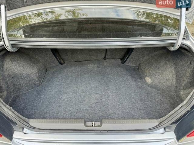 Сірий Міцубісі Lancer, об'ємом двигуна 1.58 л та пробігом 138 тис. км за 4990 $, фото 34 на Automoto.ua