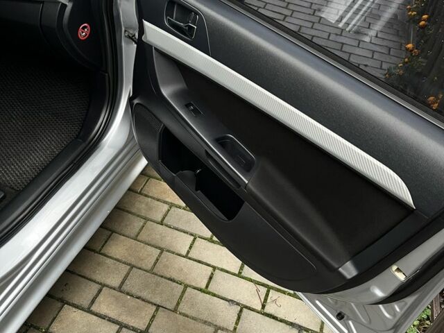 Серый Мицубиси Лансер, объемом двигателя 2 л и пробегом 227 тыс. км за 6600 $, фото 11 на Automoto.ua