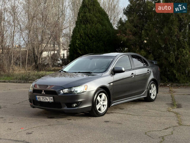Сірий Міцубісі Lancer, об'ємом двигуна 2 л та пробігом 220 тис. км за 6800 $, фото 9 на Automoto.ua