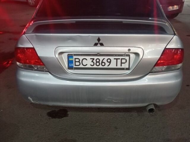 Серый Мицубиси Лансер, объемом двигателя 1.6 л и пробегом 308 тыс. км за 3800 $, фото 1 на Automoto.ua