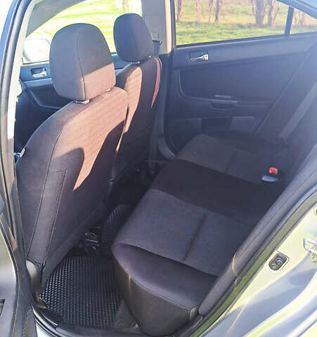 Серый Мицубиси Лансер, объемом двигателя 2 л и пробегом 226 тыс. км за 6200 $, фото 8 на Automoto.ua