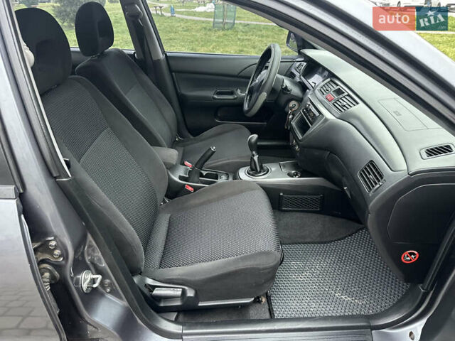 Сірий Міцубісі Lancer, об'ємом двигуна 1.6 л та пробігом 177 тис. км за 2800 $, фото 31 на Automoto.ua