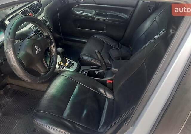 Сірий Міцубісі Lancer, об'ємом двигуна 1.6 л та пробігом 298 тис. км за 4100 $, фото 37 на Automoto.ua