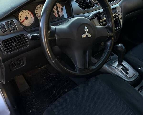 Сірий Міцубісі Lancer, об'ємом двигуна 1.6 л та пробігом 174 тис. км за 4800 $, фото 3 на Automoto.ua