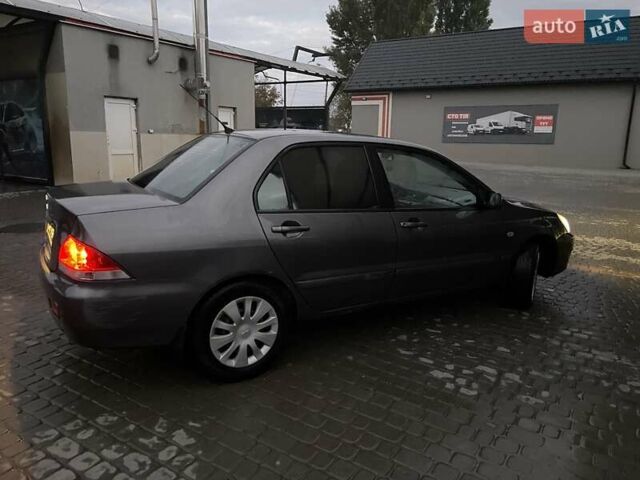 Сірий Міцубісі Lancer, об'ємом двигуна 1.6 л та пробігом 330 тис. км за 3500 $, фото 30 на Automoto.ua