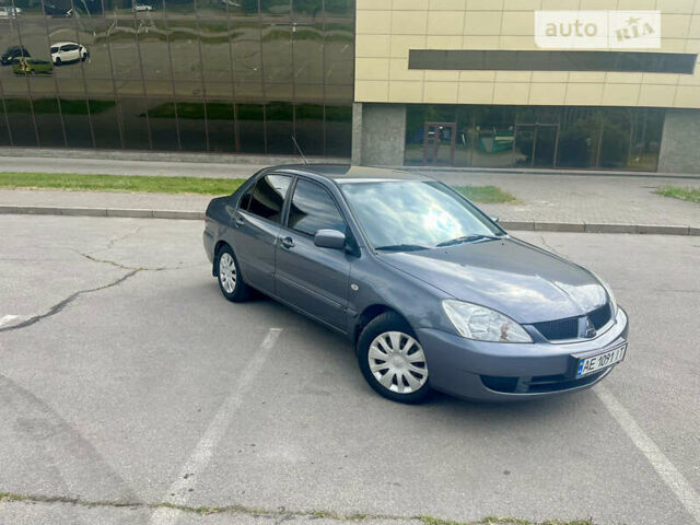 Сірий Міцубісі Lancer, об'ємом двигуна 1.6 л та пробігом 180 тис. км за 5250 $, фото 1 на Automoto.ua