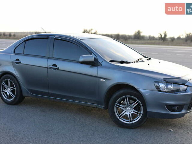 Серый Мицубиси Лансер, объемом двигателя 1.5 л и пробегом 330 тыс. км за 5250 $, фото 6 на Automoto.ua