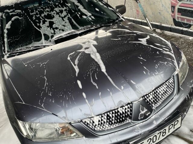 Серый Мицубиси Лансер, объемом двигателя 1.6 л и пробегом 250 тыс. км за 3999 $, фото 19 на Automoto.ua