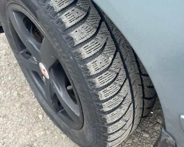 Сірий Міцубісі Lancer, об'ємом двигуна 1.58 л та пробігом 341 тис. км за 4500 $, фото 4 на Automoto.ua