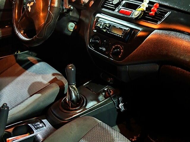 Сірий Міцубісі Lancer, об'ємом двигуна 1.6 л та пробігом 244 тис. км за 3900 $, фото 4 на Automoto.ua