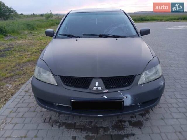 Мицубиси Лансер 2007 в Ивано-Франковске на Automoto.ua Серый Мицубиси Лансер, объемом двигателя 1.58 л и пробегом 238 тыс. км за 2950 $, фото 10 на Automoto.ua