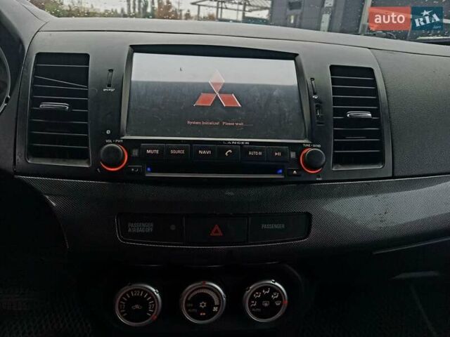 Сірий Міцубісі Lancer, об'ємом двигуна 2 л та пробігом 268 тис. км за 5555 $, фото 6 на Automoto.ua