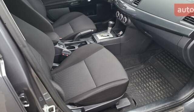 Серый Мицубиси Лансер, объемом двигателя 2 л и пробегом 189 тыс. км за 6800 $, фото 8 на Automoto.ua