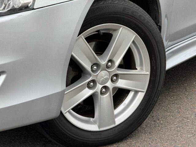 Серый Мицубиси Лансер, объемом двигателя 2 л и пробегом 207 тыс. км за 5800 $, фото 6 на Automoto.ua