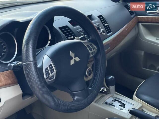 Сірий Міцубісі Lancer, об'ємом двигуна 2 л та пробігом 203 тис. км за 6999 $, фото 15 на Automoto.ua