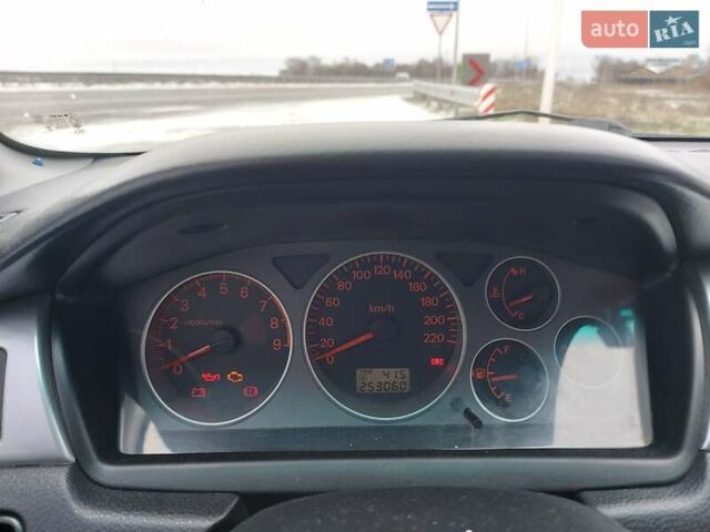 Серый Мицубиси Лансер, объемом двигателя 2 л и пробегом 253 тыс. км за 4200 $, фото 9 на Automoto.ua