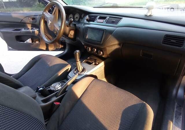 Сірий Міцубісі Lancer, об'ємом двигуна 1.6 л та пробігом 230 тис. км за 3950 $, фото 33 на Automoto.ua