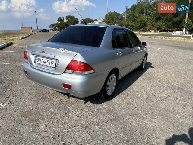 Сірий Міцубісі Lancer, об'ємом двигуна 1.6 л та пробігом 283 тис. км за 4900 $, фото 5 на Automoto.ua