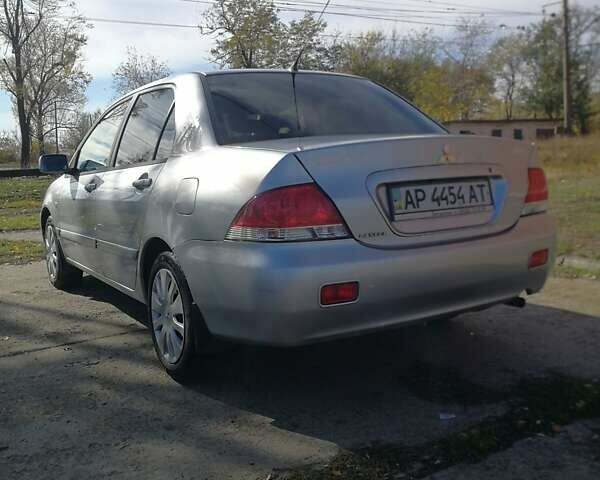 Сірий Міцубісі Lancer, об'ємом двигуна 1.6 л та пробігом 142 тис. км за 4700 $, фото 4 на Automoto.ua