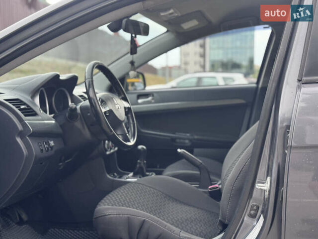 Сірий Міцубісі Lancer, об'ємом двигуна 2 л та пробігом 222 тис. км за 6300 $, фото 14 на Automoto.ua