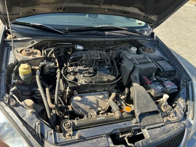 Серый Мицубиси Лансер, объемом двигателя 1.6 л и пробегом 161 тыс. км за 4800 $, фото 2 на Automoto.ua