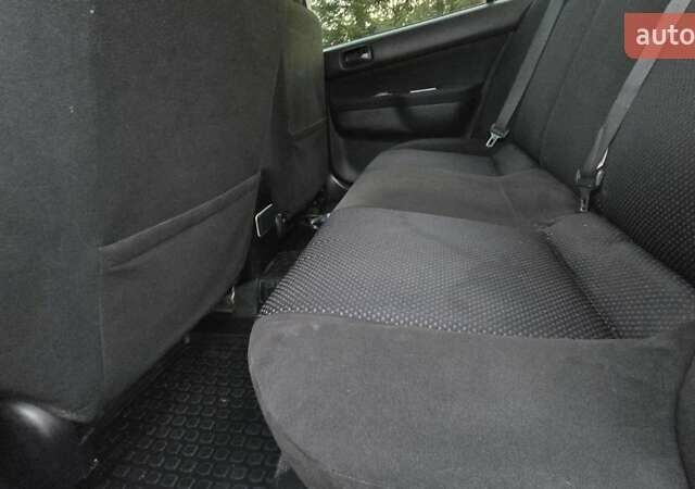 Сірий Міцубісі Lancer, об'ємом двигуна 1.6 л та пробігом 213 тис. км за 3600 $, фото 22 на Automoto.ua