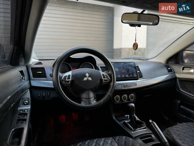 Сірий Міцубісі Lancer, об'ємом двигуна 2 л та пробігом 173 тис. км за 6800 $, фото 26 на Automoto.ua