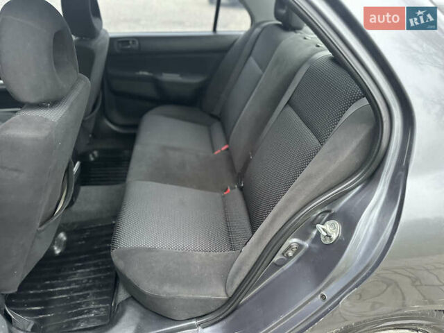 Сірий Міцубісі Lancer, об'ємом двигуна 1.6 л та пробігом 177 тис. км за 2800 $, фото 25 на Automoto.ua