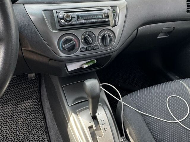 Серый Мицубиси Лансер, объемом двигателя 1.6 л и пробегом 129 тыс. км за 5000 $, фото 1 на Automoto.ua