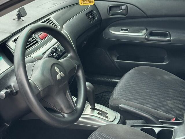 Серый Мицубиси Лансер, объемом двигателя 1.6 л и пробегом 298 тыс. км за 3600 $, фото 6 на Automoto.ua