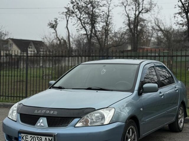 Серый Мицубиси Лансер, объемом двигателя 1.6 л и пробегом 238 тыс. км за 4300 $, фото 19 на Automoto.ua