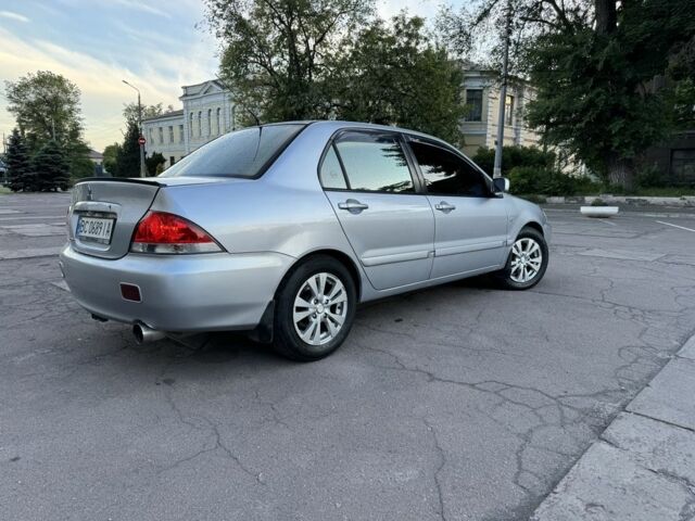 Сірий Міцубісі Lancer, об'ємом двигуна 0.16 л та пробігом 278 тис. км за 4700 $, фото 5 на Automoto.ua