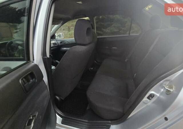 Сірий Міцубісі Lancer, об'ємом двигуна 1.6 л та пробігом 213 тис. км за 3600 $, фото 18 на Automoto.ua