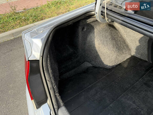 Сірий Міцубісі Lancer, об'ємом двигуна 1.3 л та пробігом 160 тис. км за 4999 $, фото 81 на Automoto.ua