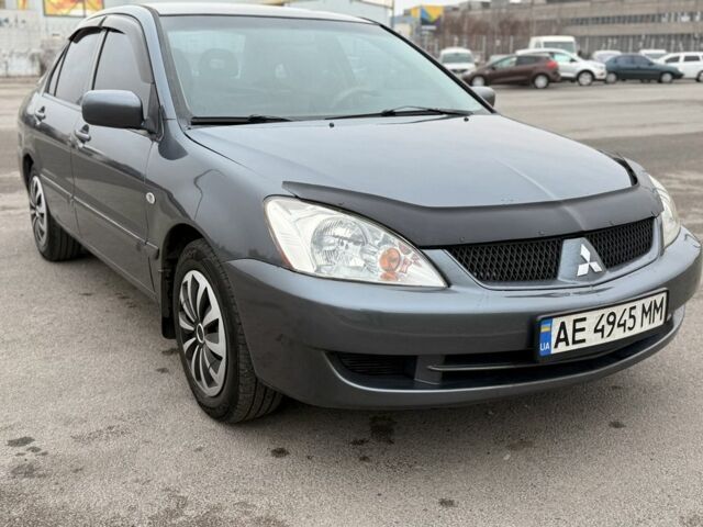 Сірий Міцубісі Lancer, об'ємом двигуна 1.6 л та пробігом 270 тис. км за 4300 $, фото 1 на Automoto.ua