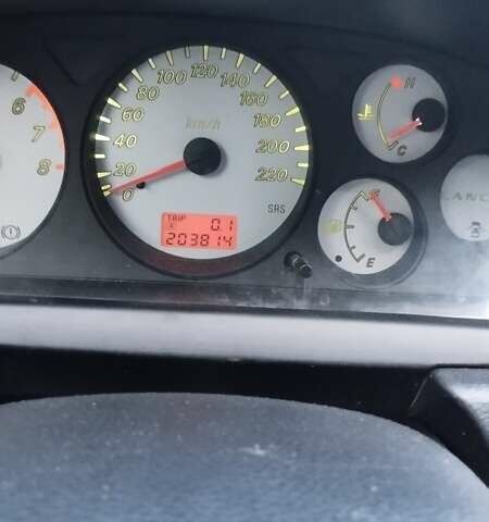 Серый Мицубиси Лансер, объемом двигателя 1.6 л и пробегом 205 тыс. км за 4500 $, фото 8 на Automoto.ua