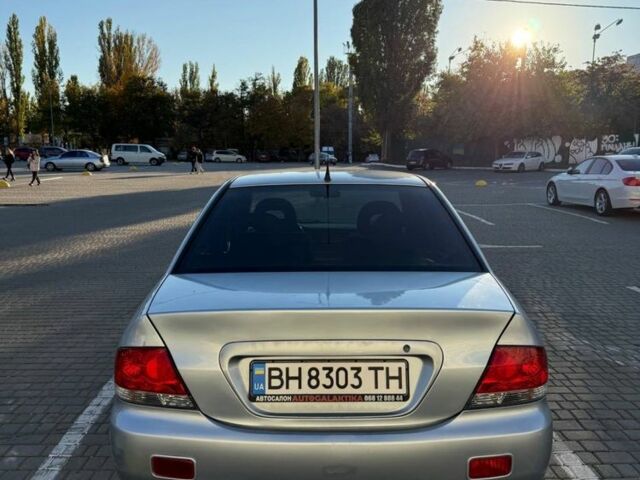Сірий Міцубісі Lancer, об'ємом двигуна 1.6 л та пробігом 174 тис. км за 4800 $, фото 3 на Automoto.ua