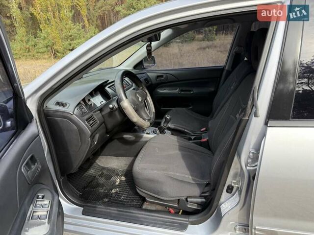 Серый Мицубиси Лансер, объемом двигателя 1.6 л и пробегом 200 тыс. км за 4400 $, фото 15 на Automoto.ua