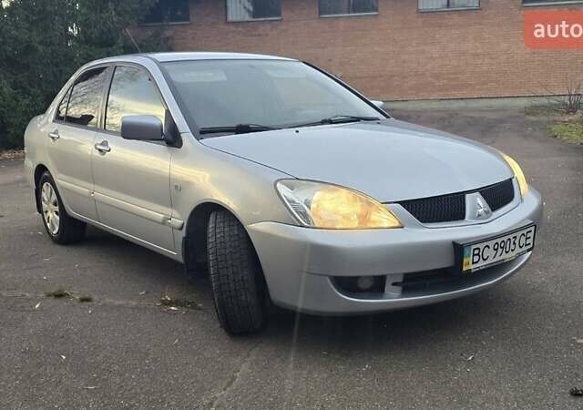 Сірий Міцубісі Lancer, об'ємом двигуна 1.6 л та пробігом 213 тис. км за 3600 $, фото 8 на Automoto.ua