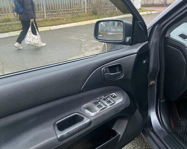 Серый Мицубиси Лансер, объемом двигателя 1.6 л и пробегом 346 тыс. км за 4299 $, фото 6 на Automoto.ua