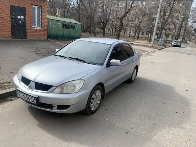 Сірий Міцубісі Lancer, об'ємом двигуна 1.6 л та пробігом 332 тис. км за 3200 $, фото 5 на Automoto.ua