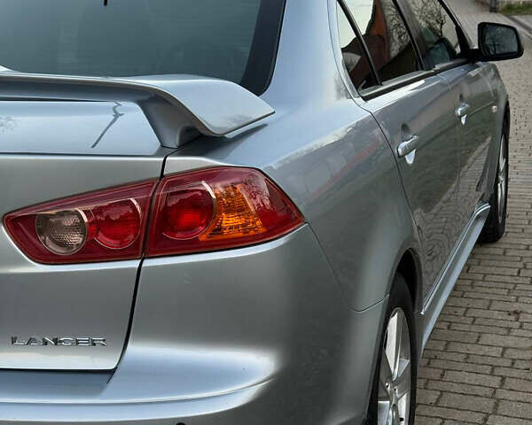 Мицубиси Лансер 2007 в Калуше на Automoto.ua Серый Мицубиси Лансер, объемом двигателя 2 л и пробегом 134 тыс. км за 8950 $, фото 13 на Automoto.ua