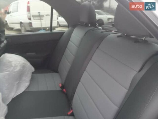 Серый Мицубиси Лансер, объемом двигателя 1.58 л и пробегом 175 тыс. км за 4000 $, фото 4 на Automoto.ua