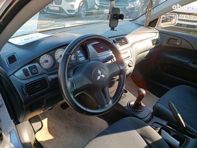 Сірий Міцубісі Lancer, об'ємом двигуна 1.6 л та пробігом 222 тис. км за 3990 $, фото 15 на Automoto.ua