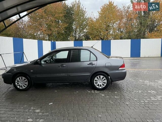 Сірий Міцубісі Lancer, об'ємом двигуна 1.6 л та пробігом 330 тис. км за 3500 $, фото 13 на Automoto.ua