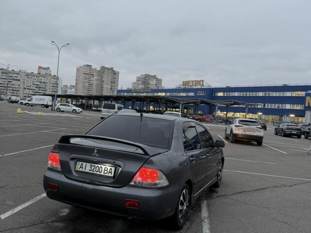 Серый Мицубиси Лансер, объемом двигателя 1.6 л и пробегом 350 тыс. км за 2850 $, фото 8 на Automoto.ua