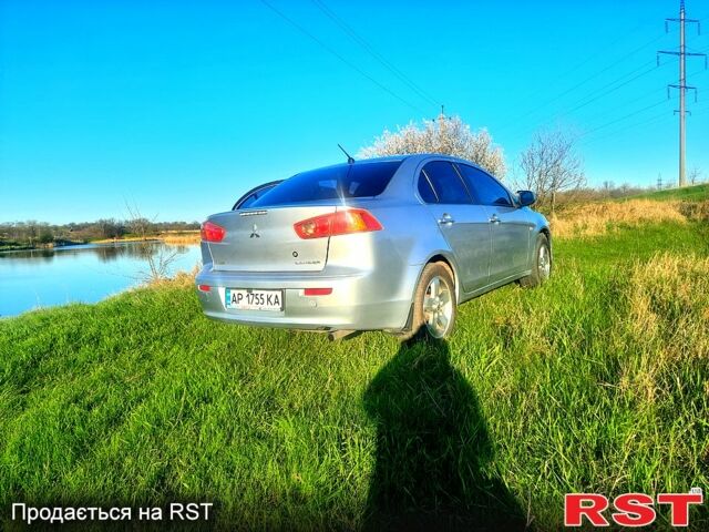 Серый Мицубиси Лансер, объемом двигателя 1.5 л и пробегом 170 тыс. км за 6600 $, фото 1 на Automoto.ua
